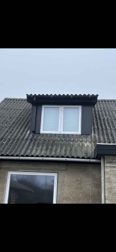 Udskiftning af nye vinduer på et hus i Thisted