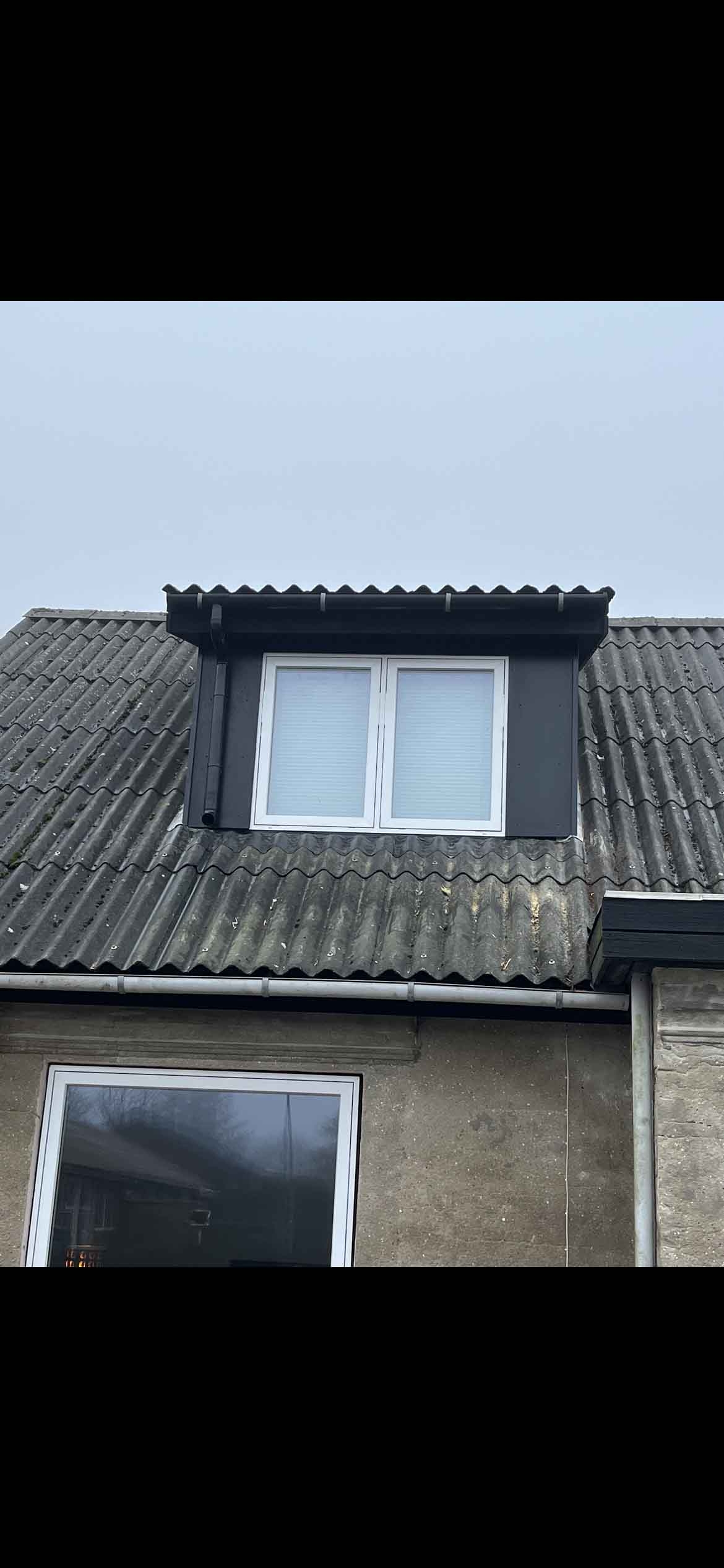 Udskiftning af nye vinduer på et hus i Thisted